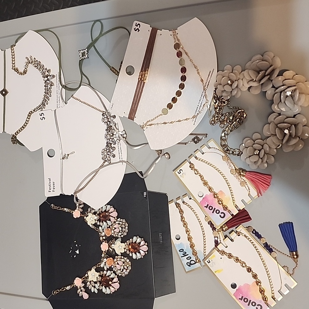 Bundle of five necklaces and three bracelets/ costume jewelry